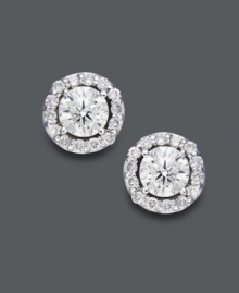 Style fit for a star. Wear this sparkling pair for any occasion, but be prepared to turn heads. Round-cut diamonds (1-1/2 ct. t.w.) shine amongst a halo of diamond accents. Crafted in 14k white gold. Approximate diameter: 8-2/10 mm. Style fit for a star. Wear this sparkling pair for any occasion, but be prepared to turn heads. Round-cut diamonds (1-1/2 ct. t.w.) shine amongst a halo of diamond accents. Crafted in 14k white gold. Approximate diameter: 8-2/10 mm.