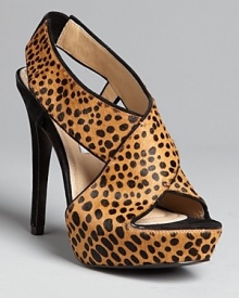 DIANE von FURSTENBERG's popular Zia design goes wild in a fashionable exotic print on luxe calf hair: Spot on.