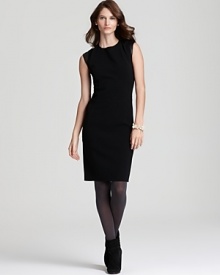 This Lafayette 148 New York black dress flaunts a sleek silhouette trimmed with supple leather for alluring day-to-night style. This Lafayette 148 New York black dress flaunts a sleek silhouette trimmed with supple leather for alluring day-to-night style.