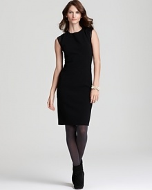 This Lafayette 148 New York black dress flaunts a sleek silhouette trimmed with supple leather for alluring day-to-night style.