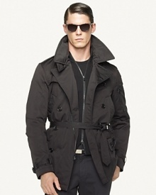 A modern interpretation of a classic double-breasted silhouette, the trim-fitting Windsor coat makes a sleek and sophisticated statement in lightly filled cotton-nylon faille. A modern interpretation of a classic double-breasted silhouette, the trim-fitting Windsor coat makes a sleek and sophisticated statement in lightly filled cotton-nylon faille.