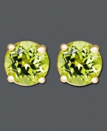 The perfect drop of color to spruce up your style. Earrings feature round-cut peridots (1 ct. t.w.) in a 14k gold post setting. Approximate diameter: 1/4 inch. The perfect drop of color to spruce up your style. Earrings feature round-cut peridots (1 ct. t.w.) in a 14k gold post setting. Approximate diameter: 1/4 inch.