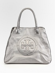 Tory's iconic logo adds a signature touch to this roomy silhouette of rich metallic pebble-grain leather.Double top handles, 7 dropMagnetic snap closureProtective metal feetOne inside zip pocketTwo inside open pocketsCotton lining18W X 13H X 8DImported