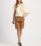 EXCLUSIVELY AT SAKS. This sculptural, asymmetrical design is rendered in luxurious raw silk.Jewel necklineSingle short sleeveSingle long peplum sleeve with gathered shoulder detailAbout 21 from shoulder to hemSilkDry cleanMade in USA of imported fabricModel shown is 5'11 (180cm) wearing US size 4. 