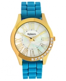 Playful turquoise color adds a lovely vibe to this golden watch from Style&co.