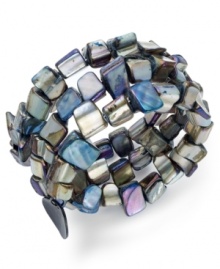 Shell connection. Style&co. has created this coil stretch bracelet featuring many sights from the sea. Crafted from hematite tone mixed metal, it's perfect for your bracelet collection. Approximate diameter: 2 inches.