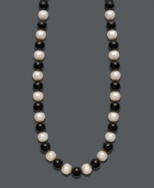 Show your true stripes with stylish, contrasting colors. Necklace features a chic strand of bold onyx beads (85 ct. t.w.) and cultured freshwater pearls (8-9 mm). Clasp crafted in 14k gold. Approximate length: 18 inches.