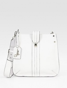 An extra roomy shape of smooth pebbled leather, finished with a signature polished metal luggage tag. Detachable shoulder strap, 17 dropFlap with push-lock closureOne inside zip pocketsTwo inside open pocketsCotton lining12½W X 11¾H X 3½DImported An extra roomy shape of smooth pebbled leather, finished with a signature polished metal luggage tag. Detachable shoulder strap, 17 dropFlap with push-lock closureOne inside zip pocketsTwo inside open pocketsCotton lining12½W X 11¾H X 3½DImported