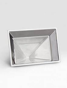 A sophisticated and dynamic display for a favorite photograph, handcrafted with flared edges from alloy metal in a pyramid silhouette tipped on its side. Accommodates a 4 X 6 photograph Wipe clean Imported A sophisticated and dynamic display for a favorite photograph, handcrafted with flared edges from alloy metal in a pyramid silhouette tipped on its side. Accommodates a 4 X 6 photograph Wipe clean Imported