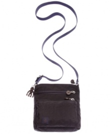 Every laid-back look deserves some fashionista flair, like this irresistible crossbody from Kipling. Crafted in sturdy nylon with plenty of pockets, it offers hands-free versatility and is sized-right for the essentials. Every laid-back look deserves some fashionista flair, like this irresistible crossbody from Kipling. Crafted in sturdy nylon with plenty of pockets, it offers hands-free versatility and is sized-right for the essentials.
