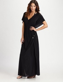 Seamlessly designed with laser-cut edges and a deep v-neck and plunge back for a seductive-yet-relaxed fit. And thanks to its new jersey fabrication, it's super soft as well.V-neckDolman sleevesDrawstring Empire waistPull-on styleHigh side slitsAbout 39 from natural waist84% polyamide/16% elastaneHand washImported Seamlessly designed with laser-cut edges and a deep v-neck and plunge back for a seductive-yet-relaxed fit. And thanks to its new jersey fabrication, it's super soft as well.V-neckDolman sleevesDrawstring Empire waistPull-on styleHigh side slitsAbout 39 from natural waist84% polyamide/16% elastaneHand washImported