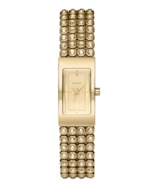 Tell time with rows of shine, thanks to this brilliant DKNY watch. Bracelet crafted from four rows of crystal set in goldtone stainless steel and rectangular case. Champagne dial features goldtone hands, stick indices and logo. Quartz movement. Water resistant to 50 meters. Two-year limited warranty.