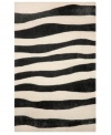 A suggested zebra stripe adds a hint of wild energy to the Spello Wavey Stripe area rug, while its tame color palette lends itself to any modern home décor. This unique home accent is intricately hand-tufted for crafted durability and supreme detailing in composition.