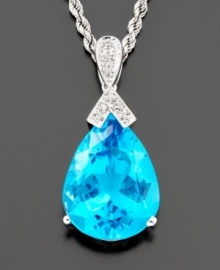 A drop of color adds interest to everything you wear. This pear-shaped pendant glistens with blue topaz (18-3/8 ct. t.w) with diamond accents set in 14k white gold. Drop measures 1 inch. Chain measures 18 inches. A drop of color adds interest to everything you wear. This pear-shaped pendant glistens with blue topaz (18-3/8 ct. t.w) with diamond accents set in 14k white gold. Drop measures 1 inch. Chain measures 18 inches.