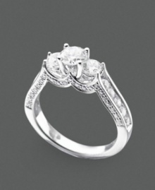 A three-stone ring with vintage appeal featuring round-cut diamonds (1-1/2 ct. t.w.) set in 14k white gold. A three-stone ring with vintage appeal featuring round-cut diamonds (1-1/2 ct. t.w.) set in 14k white gold.
