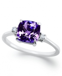 Sparkling perfection. This chic, cushion-cut ring features a tanzanite center stone (1-5/8 ct. t.w.) accented by round-cut diamonds on the sides. Set in 14k white gold. Sparkling perfection. This chic, cushion-cut ring features a tanzanite center stone (1-5/8 ct. t.w.) accented by round-cut diamonds on the sides. Set in 14k white gold.