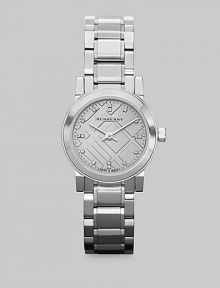 A sleek stainless steel design that features an iconic check dial with diamond markers. Quartz movementWater resistant to 5 ATMRound stainless steel case, 26mm (1)Smooth bezelSilvertone check dialSixteen diamond hour markersStainless steel link braceletMade in Switzerland 