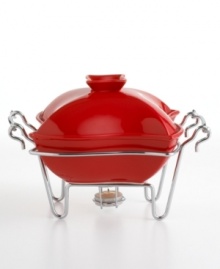 Ensure every guest gets a hot meal with this stylish covered warmer in gleaming red porcelain. Set in an elegant metal caddy with a tealight candle for extra heat. Ensure every guest gets a hot meal with this stylish covered warmer in gleaming red porcelain. Set in an elegant metal caddy with a tealight candle for extra heat.