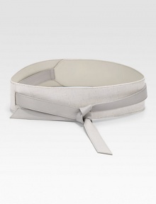 This Asian-inspired style boasts a supple two-tone leather design and a tie closure. Width, about 3Imported This Asian-inspired style boasts a supple two-tone leather design and a tie closure. Width, about 3Imported