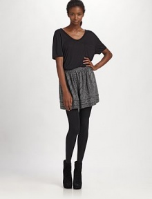 Chic jacquard cable-knit gathers softly in this abbreviated A-line silhouette.Mid-rise waist Pull-on style About 15 long 82% acrylic/18% wool Dry clean Made in USA Chic jacquard cable-knit gathers softly in this abbreviated A-line silhouette.Mid-rise waist Pull-on style About 15 long 82% acrylic/18% wool Dry clean Made in USA