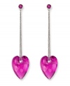 Embrace your playful, romantic side. Swarovski's drop-shaped earrings feature a beautiful, puffed heart silhouette on a stainless steel chain. Created in Fuchsia crystal in an exclusive cut. Approximate drop: 2-1/4 inches.