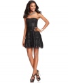 Sweet and saucy: BCBGMAXAZRIA's sequined dress is party-ready with a strapless mini silhouette and fully tiered skirt.