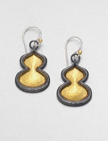 A voluptuous design in beautifully hammered 24k gold center surrounded by darkened sterling silver. 24k goldSterling silverDrop, about 1Hook backImported A voluptuous design in beautifully hammered 24k gold center surrounded by darkened sterling silver. 24k goldSterling silverDrop, about 1Hook backImported