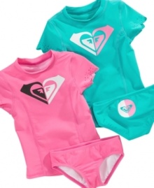 Keep her guard up. She'll be protected from the surf and sand while staying stylish in this rad rashguard and bikini-bottom swimwear set from Roxy. Keep her guard up. She'll be protected from the surf and sand while staying stylish in this rad rashguard and bikini-bottom swimwear set from Roxy.