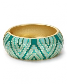 Aqua puts an on-trend spin on this season's global influences with this enamel bangle. This piece's bold zig-zag print perfects an eclectic look an armful of similar styles. Aqua puts an on-trend spin on this season's global influences with this enamel bangle. This piece's bold zig-zag print perfects an eclectic look an armful of similar styles.