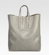 A graphic-inspired tote that resembles city cool, rendered in genuine printed leather.Top handlesLeather12W x 14H x 4DMade in Italy