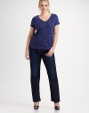 Matte sequins adds a luxe touch to this airy linen knit.V neckline Short sleeves Pullover style Linen; hand wash Imported