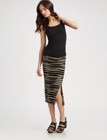 Fabulous and fitted, this lengthy essential has an abstract stripe print and alluring side slit. Elastic waistbandSide slitAbout 30 longViscoseDry cleanMade in USA of imported fabricModel shown is 5'10 (177cm) wearing US size Small. Fabulous and fitted, this lengthy essential has an abstract stripe print and alluring side slit. Elastic waistbandSide slitAbout 30 longViscoseDry cleanMade in USA of imported fabricModel shown is 5'10 (177cm) wearing US size Small.