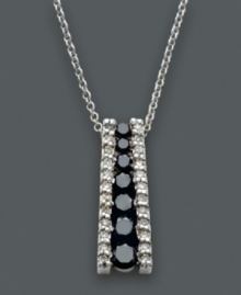 Add a sleek drop of sparkling sophistication. This chic Effy Collection necklace features a graduated drop design decorated with a row of round-cut black diamonds (3/8 ct. t.w.) at the center and two side rows of white diamonds (1/5 ct. t.w.). Set in 14k white gold. Approximate length: 18 inches. Approximate drop: 3/4 inch. Add a sleek drop of sparkling sophistication. This chic Effy Collection necklace features a graduated drop design decorated with a row of round-cut black diamonds (3/8 ct. t.w.) at the center and two side rows of white diamonds (1/5 ct. t.w.). Set in 14k white gold. Approximate length: 18 inches. Approximate drop: 3/4 inch.