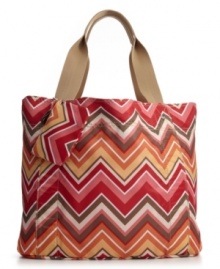 Change your mind without changing your handbag. This eye-catching Frank Sarto tote can be easily reversed for a different design anytime you get the urge to change things up. Change your mind without changing your handbag. This eye-catching Frank Sarto tote can be easily reversed for a different design anytime you get the urge to change things up.