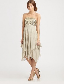 Ethereal and dazzling in embellished silk chiffon, fitted at the top and then loosely tiered from bodice to hem.StraplessEmbroidered bodiceTiered skirtAsymmetrical hemCenter back zipperAbout 36 from natural waistSilkDry cleanImportedModel shown is 5'11 (180cm) wearing US size 4. Ethereal and dazzling in embellished silk chiffon, fitted at the top and then loosely tiered from bodice to hem.StraplessEmbroidered bodiceTiered skirtAsymmetrical hemCenter back zipperAbout 36 from natural waistSilkDry cleanImportedModel shown is 5'11 (180cm) wearing US size 4.