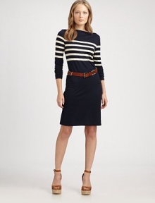 Sleek and chic, with sporty stripes and a slim, body-conscious shape in a silky knit.Boat necklineLong sleevesPullover stylingAbout 20½ from natural waist80% viscose/20% woolDry cleanImported Please note: Belt sold separately.Model shown is 5'7½ (171cm) wearing US size Small. 