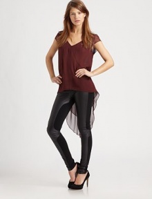 Stunning silk v-back top with semi-sheer cap sleeves and an emphasized hi-lo hem. V-neckSemi-sheer cap sleevesV-backHi-lo hemFully linedSilkDry cleanImportedModel shown is 5'10 (177cm) wearing US size Small. Stunning silk v-back top with semi-sheer cap sleeves and an emphasized hi-lo hem. V-neckSemi-sheer cap sleevesV-backHi-lo hemFully linedSilkDry cleanImportedModel shown is 5'10 (177cm) wearing US size Small.