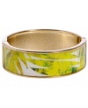 Channel the exoticism and energy of Brasil in Haskell's inspired skinny bangle. The Palm bangle features a yellow and green palm leaf print design, set in gold tone mixed metal with a hinge clasp. Approximate diameter: 2-1/2 inches. Approximate length: 8 inches. Item comes packaged in a green gift box.