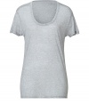 Lovely heather grey oversized t-shirt - Be comfortable and stylish in this luxe t-shirt -Cozy yet chic oversized fit - Perfect for lounging around or paired with figure-hugging leggings - Made by high-end intimate apparel brand Kiki de Montparnasse