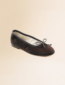 The perfect slip-on shoe for girls, with a sweet tie bow at the vamp. Suede outer; leather sole Pancake leather heel Made in Italy The perfect slip-on shoe for girls, with a sweet tie bow at the vamp. Suede outer; leather sole Pancake leather heel Made in Italy