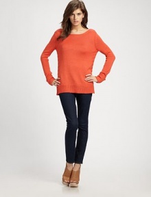Snug alpaca and silk boatneck with dropped shoulders, lengthy silhouette and long dolman sleeves. BoatneckDropped shouldersLong dolman sleevesRibbed cuffs and hem70% alpaca/30% silkDry cleanImported of Italian fabric
