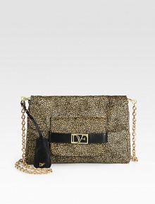 An exotic style in lush haircalf with a stunning leopard print and goldtone hardware.Detachable shoulder strap, 22 dropMagnetic flap closureOne outer zip compartmentTwo open and one zip inner compartmentsOne pen holderFully lined12W X 8H X 1DImported An exotic style in lush haircalf with a stunning leopard print and goldtone hardware.Detachable shoulder strap, 22 dropMagnetic flap closureOne outer zip compartmentTwo open and one zip inner compartmentsOne pen holderFully lined12W X 8H X 1DImported