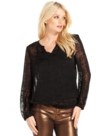 Calvin Klein Jeans offers an ethereal look with this semi-sheer burnout peasant top. Pair it with metallic jeggings for a look high in contrast and style. Calvin Klein Jeans offers an ethereal look with this semi-sheer burnout peasant top. Pair it with metallic jeggings for a look high in contrast and style.