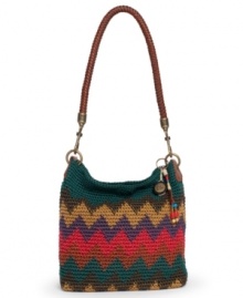 Hot hues and cool crochet adorn this laid-back look from The Sak that showcases a '70s-inspired style. The bold zig-zag pattern, antiqued silver-tone hardware and slouchy silhouette keep things casual day or night. Pairs perfectly with dark denim or flirty frocks. Hot hues and cool crochet adorn this laid-back look from The Sak that showcases a '70s-inspired style. The bold zig-zag pattern, antiqued silver-tone hardware and slouchy silhouette keep things casual day or night. Pairs perfectly with dark denim or flirty frocks.