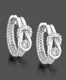 Turn an every day look into utter elegance with Everlon's diamond hoop earrings. Each earring features a round-cut diamond (1/4 ct. t.w.) in a sleek sterling silver setting. Approximate drop: 5/8 inch. Turn an every day look into utter elegance with Everlon's diamond hoop earrings. Each earring features a round-cut diamond (1/4 ct. t.w.) in a sleek sterling silver setting. Approximate drop: 5/8 inch.