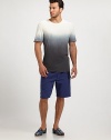 A cotton classic refreshed with ombre dip dyeing that starts at the chest and fades to black at the hem. Banded crewneckShort sleevesCottonMachine washImported