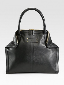 A sleek design in supple leather, perfect for all your daily essentials.Double top handles, 5 dropTop zip closureMagnetic fold-down cornersOne inside zip pocketOne inside open pocketCotton lining13½W X 12H X 4½DMade in Italy A sleek design in supple leather, perfect for all your daily essentials.Double top handles, 5 dropTop zip closureMagnetic fold-down cornersOne inside zip pocketOne inside open pocketCotton lining13½W X 12H X 4½DMade in Italy