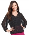 A petite polka dot print is a fun-but-sophisticated finish on Sunny Leigh's latest blouse.