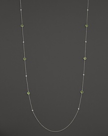 Bezel set diamonds and peridot stones in a sterling silver chain. From Ippolita.