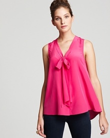Swing into the new season with this Lilly Pulitzer top flaunting an effortless A-line silhouette, trimmed with a chic neck tie for everyday polish. Swing into the new season with this Lilly Pulitzer top flaunting an effortless A-line silhouette, trimmed with a chic neck tie for everyday polish.